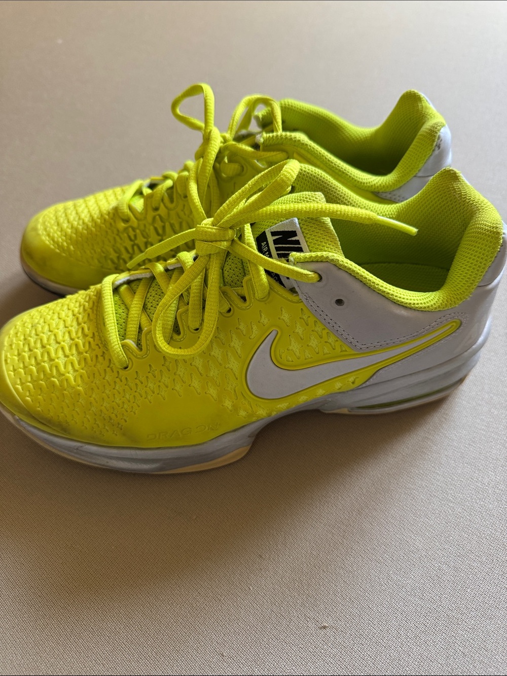 Nike Neon Yellow Tennis Shoes with White Swoosh